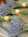 Lavender bunches tied with twine on wood table Royalty Free Stock Photo