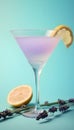 Lavender cocktail with lemon and lavender flowers on blue background