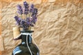 Lavender in a dark bottle with cork