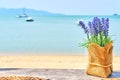 Lavender decoration table accent at the beach bar. Vacation, get away, summer outing concept Royalty Free Stock Photo