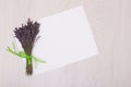 Lavender desk with flowers on background top view mock up.White paper postcard Royalty Free Stock Photo