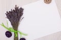 Lavender desk with flowers on background top view mock up.White paper postcard Royalty Free Stock Photo