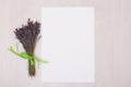 Lavender desk with flowers on background top view mock up.White paper postcard Royalty Free Stock Photo