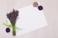 Lavender desk with flowers on background top view mock up.White paper postcard Royalty Free Stock Photo