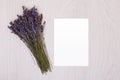 Lavender desk with flowers on background top view mock up.White paper postcard Royalty Free Stock Photo