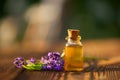 lavender essential oil in a beautiful bottle on table Royalty Free Stock Photo