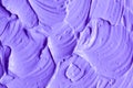 Lavender face cream/mask/body wrap texture close up. Brush strokes. Selective focus. Abstract violet background Royalty Free Stock Photo