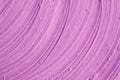 Lavender face cream mask texture close up. Brush strokes. Selective focus. Abstract background Royalty Free Stock Photo