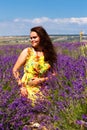 Lavender field, blue sky and sweet girl, young woman,