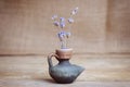 Lavender flower in bottle on wooden table