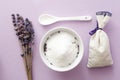 Lavender flower, sachet, salt scrub in ceramic bowl, white spoon