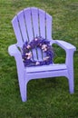 Lavender flowered wreath in purple chair