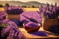 Lavender flowers in a bowl on a wooden table