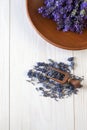 Lavender flowers. Concept for spa, beauty and health salon, cosmetics store. Natural cosmetics. Close up photo on white wooden Royalty Free Stock Photo