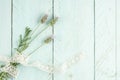 Lavender flowers on a green wooden background decorated with ribbon Royalty Free Stock Photo