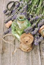 Lavender flowers herbal oil bottle rustic vintage wooden background Royalty Free Stock Photo