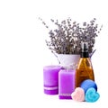 Lavender flowers, lavender oil, soap and scented candles isolated on white. Free space for text Royalty Free Stock Photo