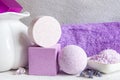 Lavender flowers, lavender soap, aromatic sea salt, lavender shampoo and towels. Concept for spa, beauty and health salon, Royalty Free Stock Photo