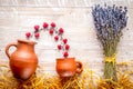 Lavender flowers with raspberry on rustic background top view mock up Royalty Free Stock Photo
