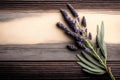 Lavender flowers on rustic wooden background. Toned.