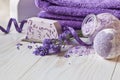 Lavender flowers, soap, aromatic sea salt and towels. Concept for spa, beauty and health salon, cosmetics store. Natural cosmetics Royalty Free Stock Photo