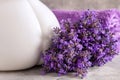 Lavender flowers and towels. Concept for spa, beauty and health salon, cosmetics store. Close up photo on marble background Royalty Free Stock Photo