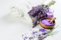 Lavender flowers and lavender salt, soap, candle and white towels for spa aroma therapy Royalty Free Stock Photo