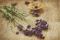 Lavender purple flowers and incense aroma cones on a wooden table. Royalty Free Stock Photo