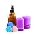 Lavender shampoo, soap and scented candles isolated on white