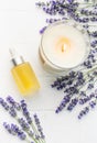 Lavender spa. Lavender natural essential oil, aromatic candle and fresh lavender Royalty Free Stock Photo