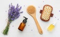 Lavender spa. Lavender salt, natural essential oil, massage brushes and fresh lavender Royalty Free Stock Photo