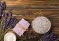 Lavender spa.Sea salt,lavender flowers,aroma candle,body cream and handmade soap Royalty Free Stock Photo