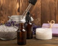 Lavender spa.Sea salt,lavender flowers,aroma candle,body cream and handmade soap Royalty Free Stock Photo