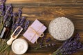 Lavender spa.Sea salt,lavender flowers,aroma candle,body cream and handmade soap Royalty Free Stock Photo