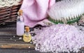 Lavender spa setting: salt, essential oil and dried flowers natural spa products and decor for bath on light background Royalty Free Stock Photo