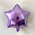 Lavender star shaped foil balloon Royalty Free Stock Photo
