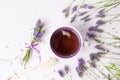 Lavender tea with flowers and sugar stick Royalty Free Stock Photo