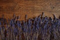 Lavender twigs on a wooden background Royalty Free Stock Photo