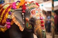a lavishly decorated elephant at a hindu festival