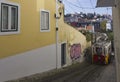 Lavra Funicular going up in the narrow street