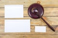 Law concept. Business card. Corporate stationery set mockup. Blank textured brand ID elements on wooden table, gavel Royalty Free Stock Photo