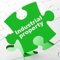 Law concept: Industrial Property on puzzle background Royalty Free Stock Photo