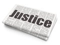 Law concept: Justice on Newspaper background Royalty Free Stock Photo