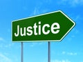 Law concept: Justice on road sign background