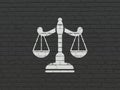 Law concept: Scales on wall background Royalty Free Stock Photo