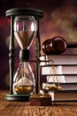 Law concept, scales and time Royalty Free Stock Photo