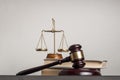 Law concept. Wooden judge gavel with law books ,scales of justice on table in a courtroom or enforcement office. Royalty Free Stock Photo