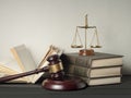 Law concept. Wooden judge gavel with law books ,scales of justice on table in a courtroom or enforcement office. Royalty Free Stock Photo