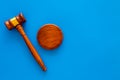 Law and court. Lawyer, attorney, judge concept. Judge gavel on blue background top view copy space Royalty Free Stock Photo