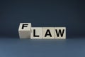 Law or Flaw. Cubes form the words Law or Flaw